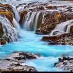 Wasserfälle in Island: Brúarfoss der blaue Wasserfall